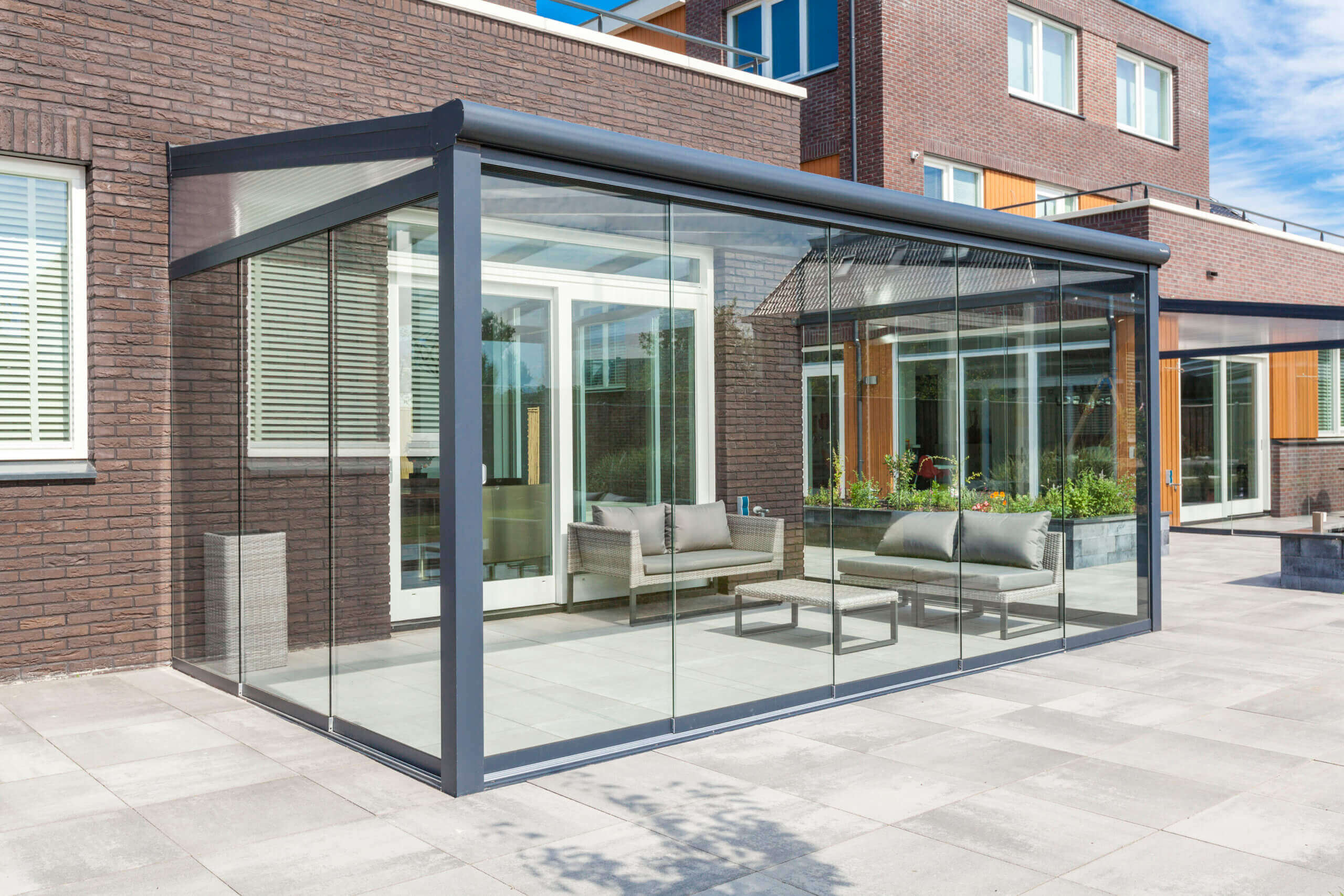 overkapping schoonmaken glazen wand